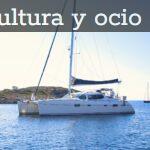 white and black sail boat on sea during daytime